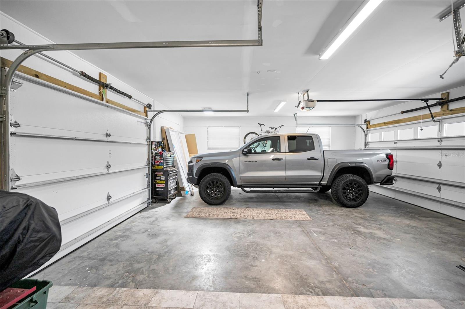2 Car + Garage In & Out garage hurricane doors