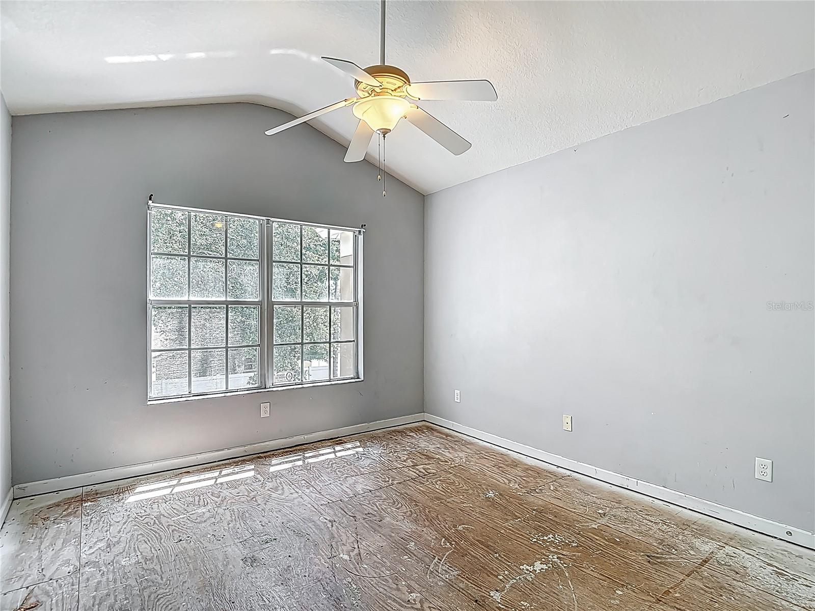 At the door of bedroom 1. The windows faces east. To your left ( out of view) is the entrance to the upstairs full bath. to your immediate right is a wall to wall closet.