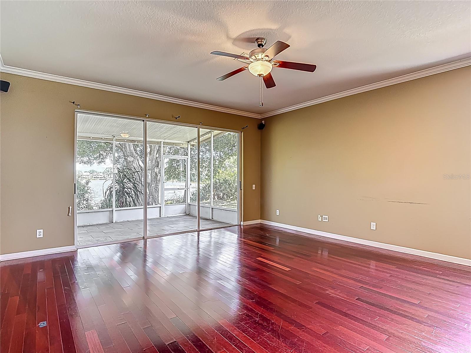 You are now back at the base of the stairs, view into great room. Kitchen to your right.