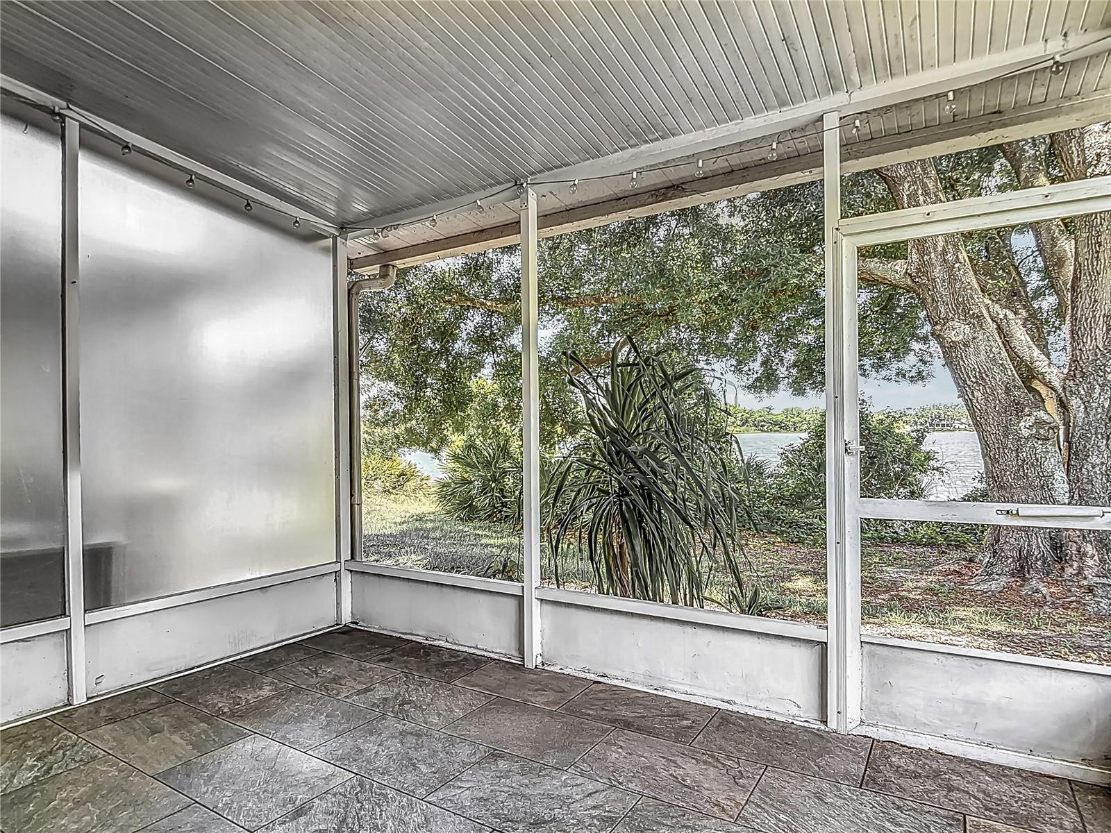 Screen enclosed lanai with peaceful views.