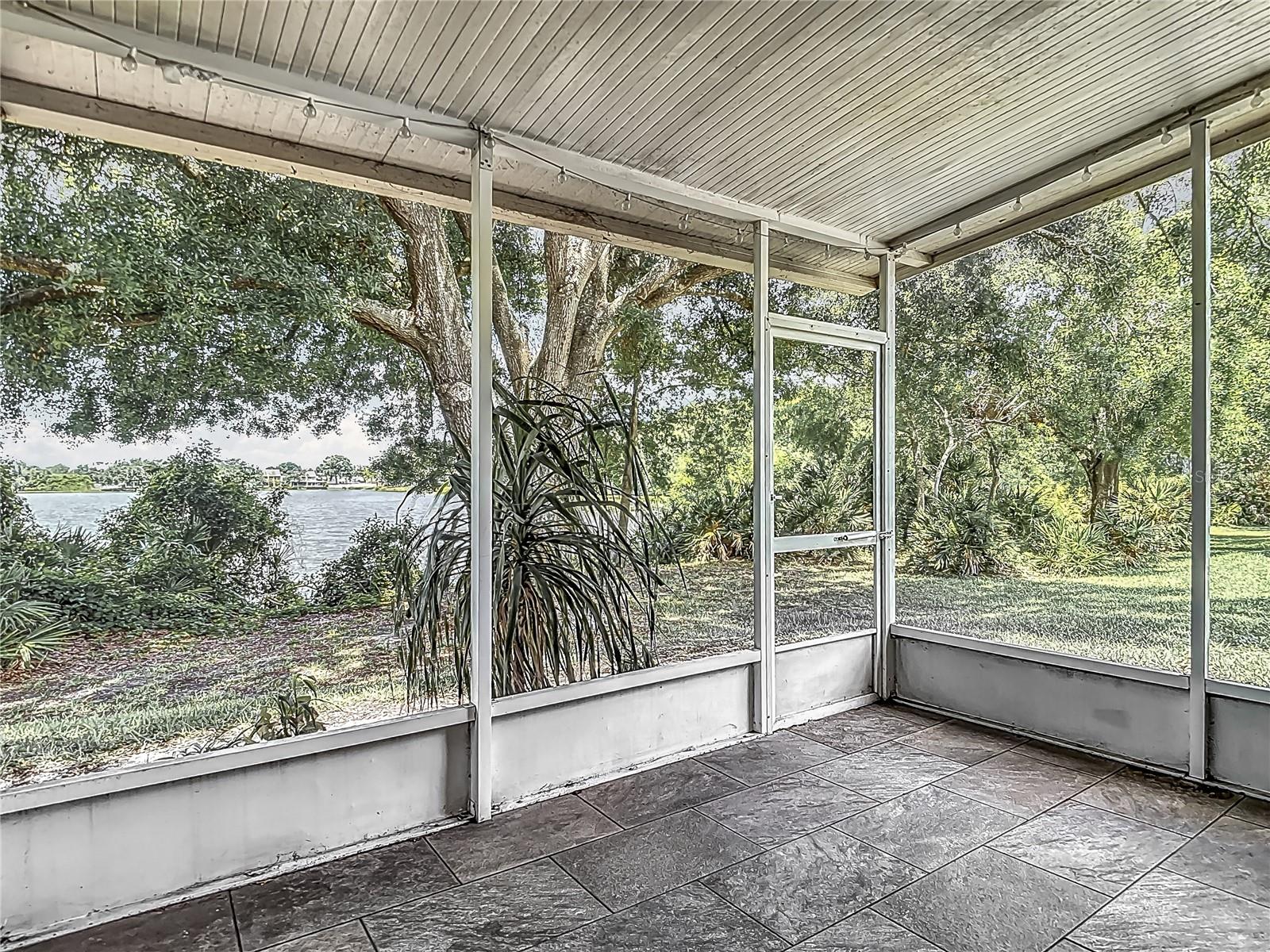 Screen enclosed lanai with peaceful views.