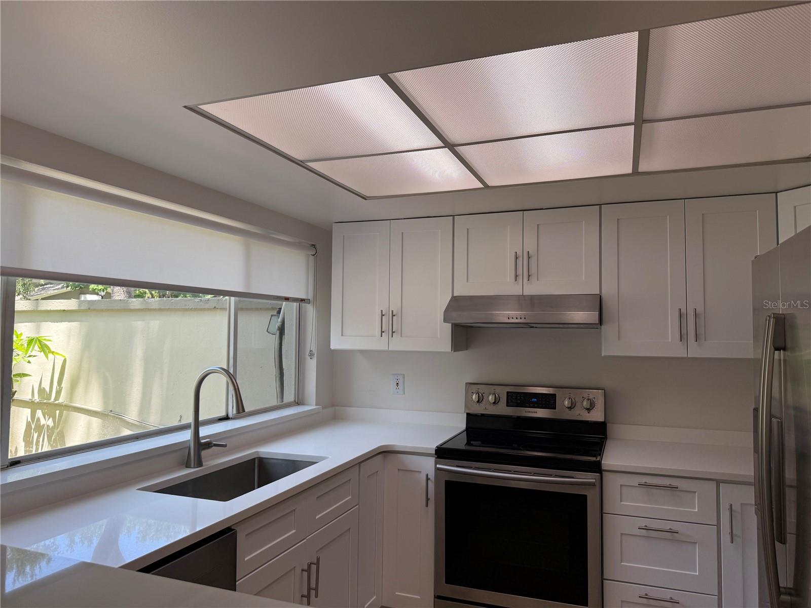 Remodeled Kitchen with Stainless Applicances