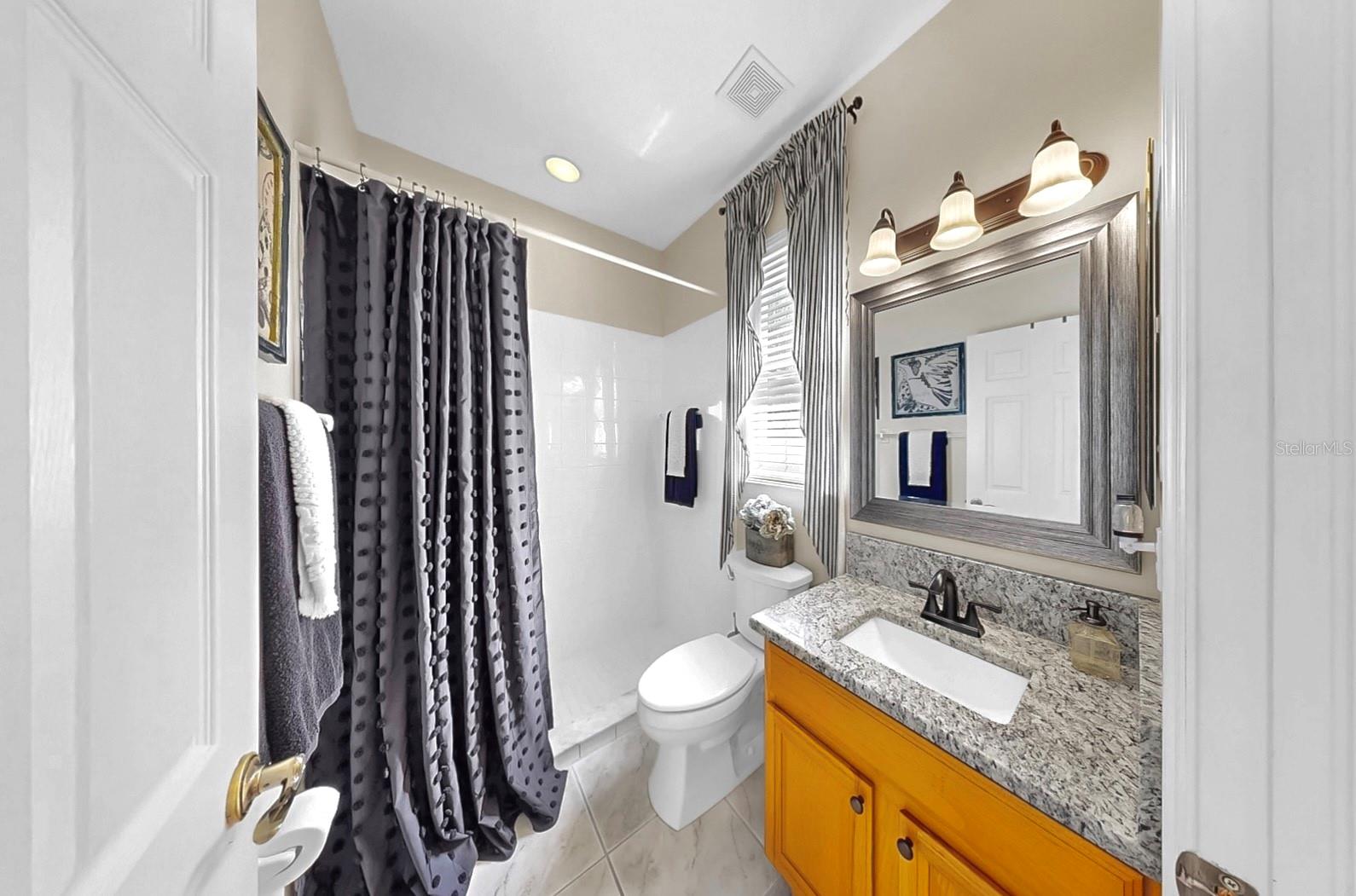 3rd Bath with door to back yard