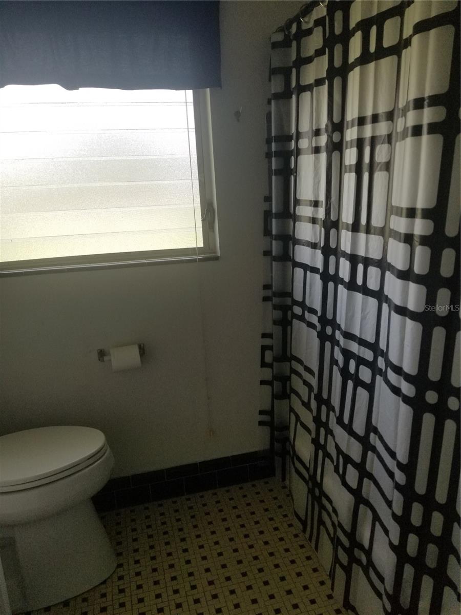 Bathroom with tub.