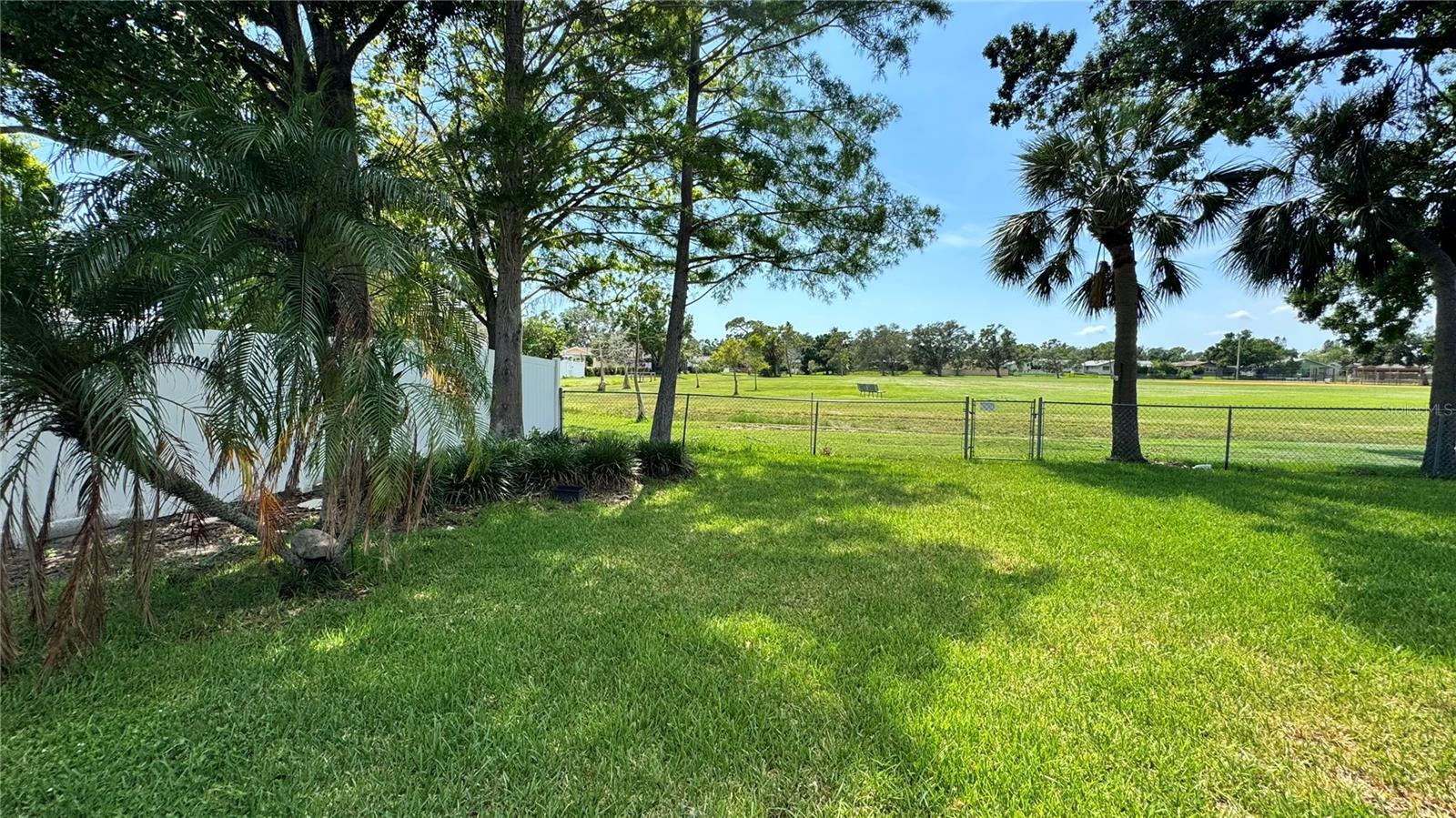 Your back yard flows right into the green space of the park