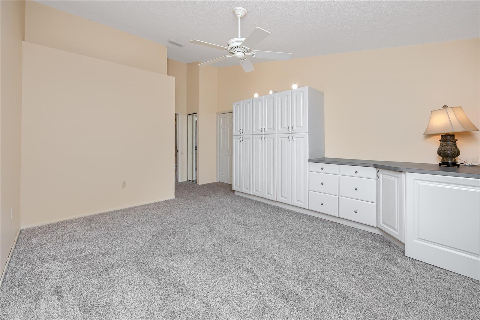 Primary Bedroom with Builtins -5524 Salem Square Dr N, Palm Harbor, FL 34685