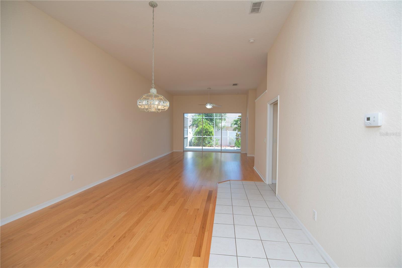 Dining room with wood floors.
