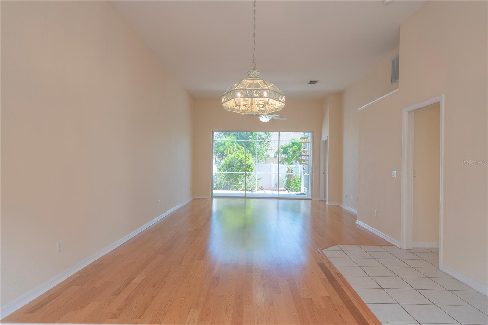 Dining room with wood floors.