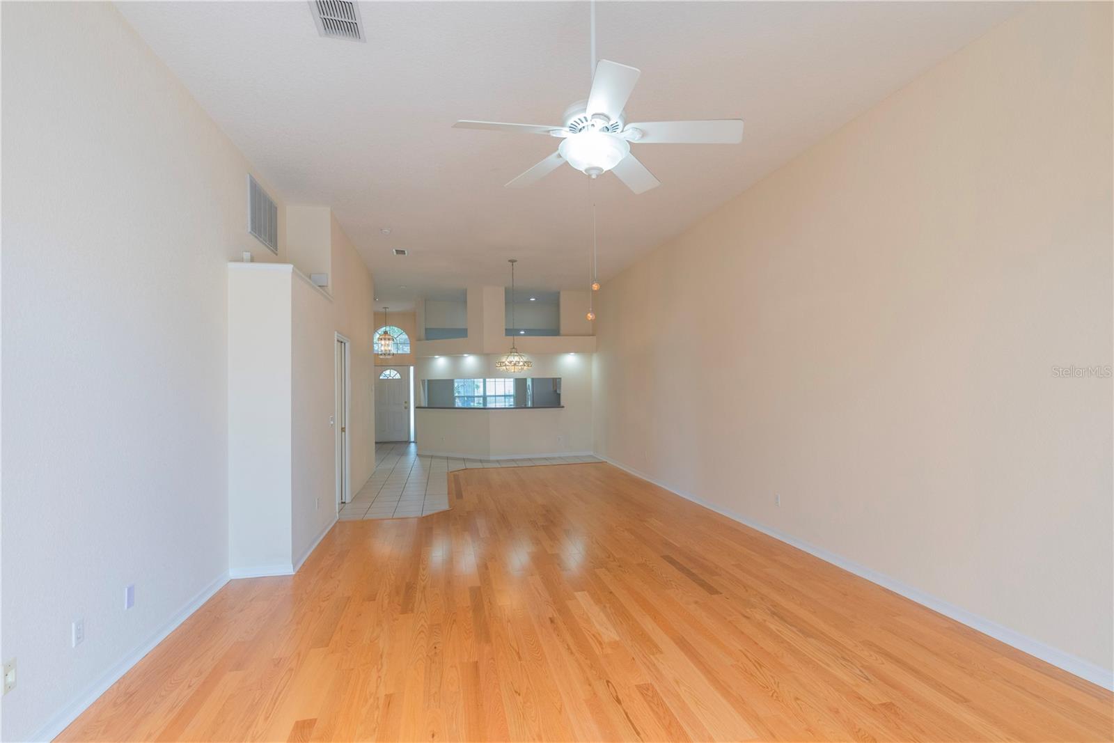 Living room with wood floors.