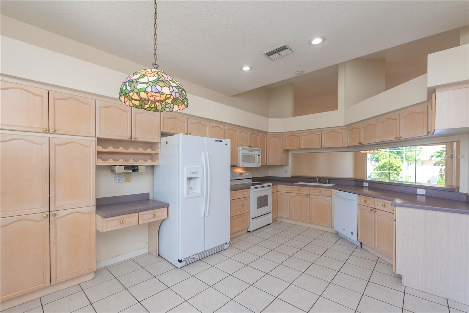 Kitchen with matching white appliances.