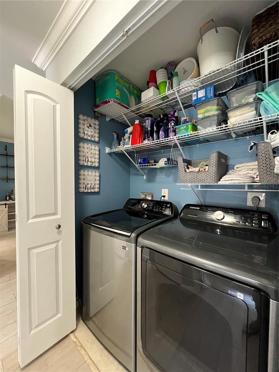 Hallway Laundry closet with NEW washer and dryer