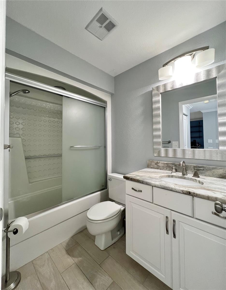 2nd bathroom with shower door open