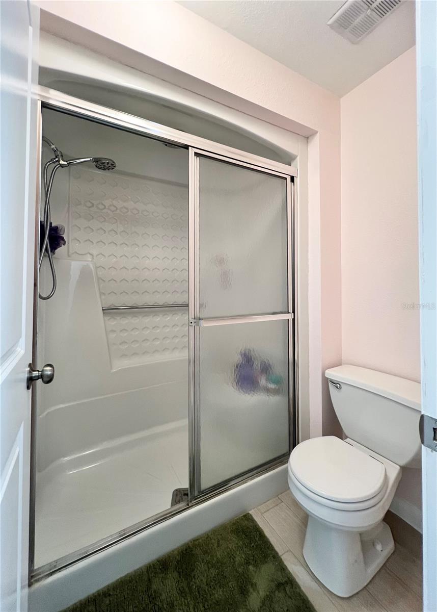 Primary bathroom with seperate shower/toilet area