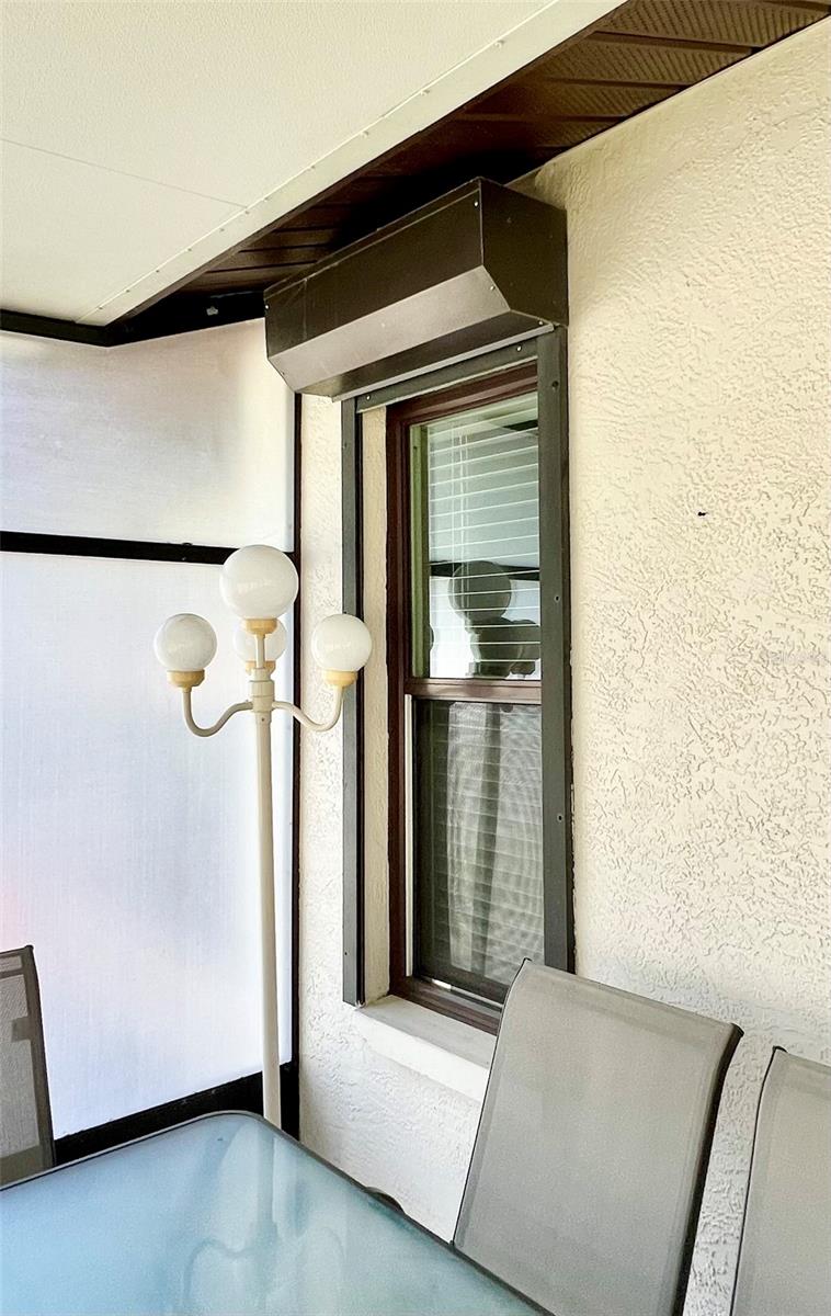 Primary bedroom has hurricane shutter also