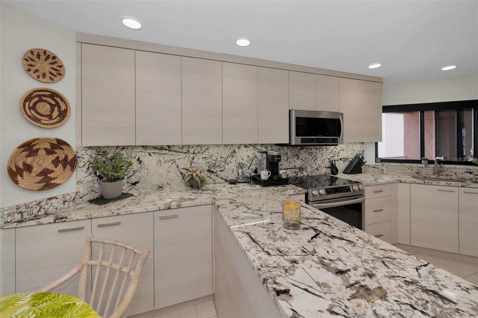 Cucina Features the Finest Imported Italian Marble & Custom Euro-Style Cabinetry.