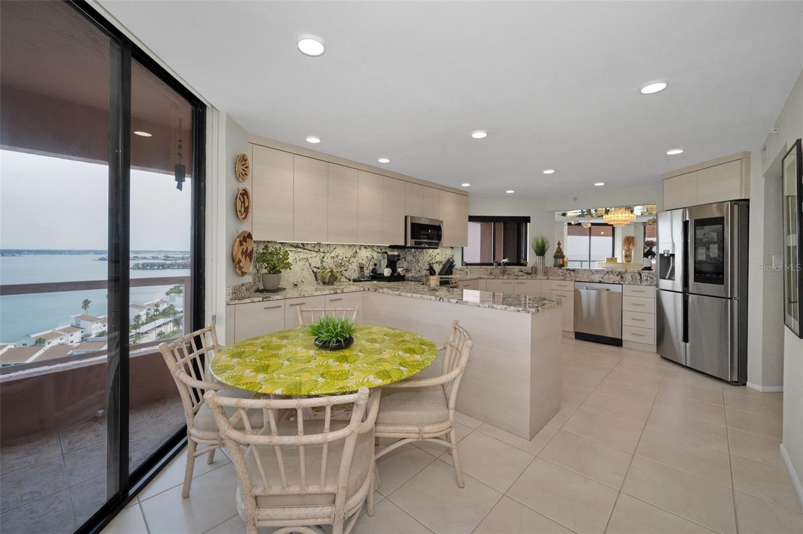 Light & Bright Cucina Features an Abundance of Natural Light, Seascapes & Terrace Access!