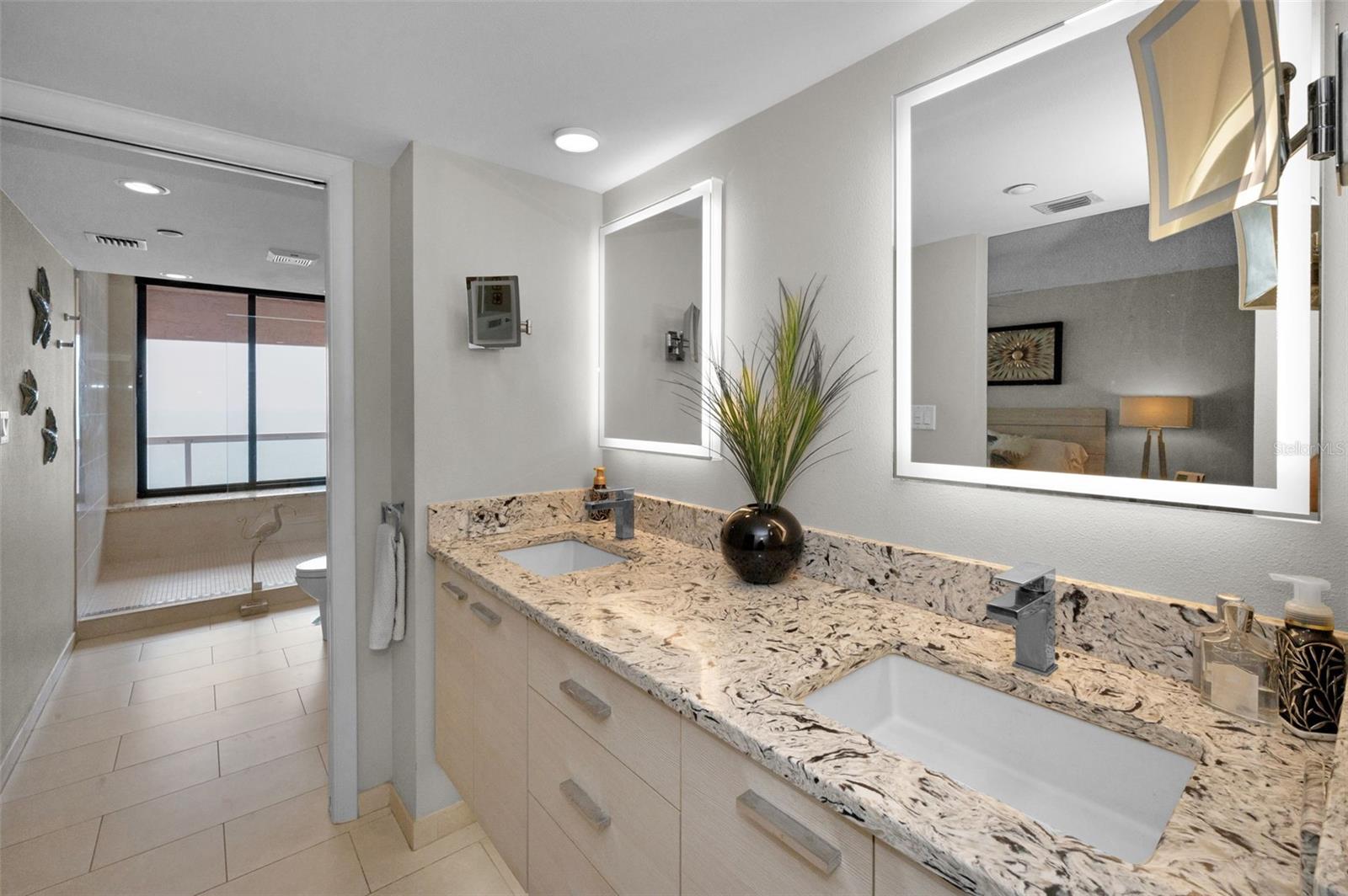 Master Bath Retreat with Dual Sink Vanity, Spacious Walk In Shower, Imported Italian Marble Throughout.