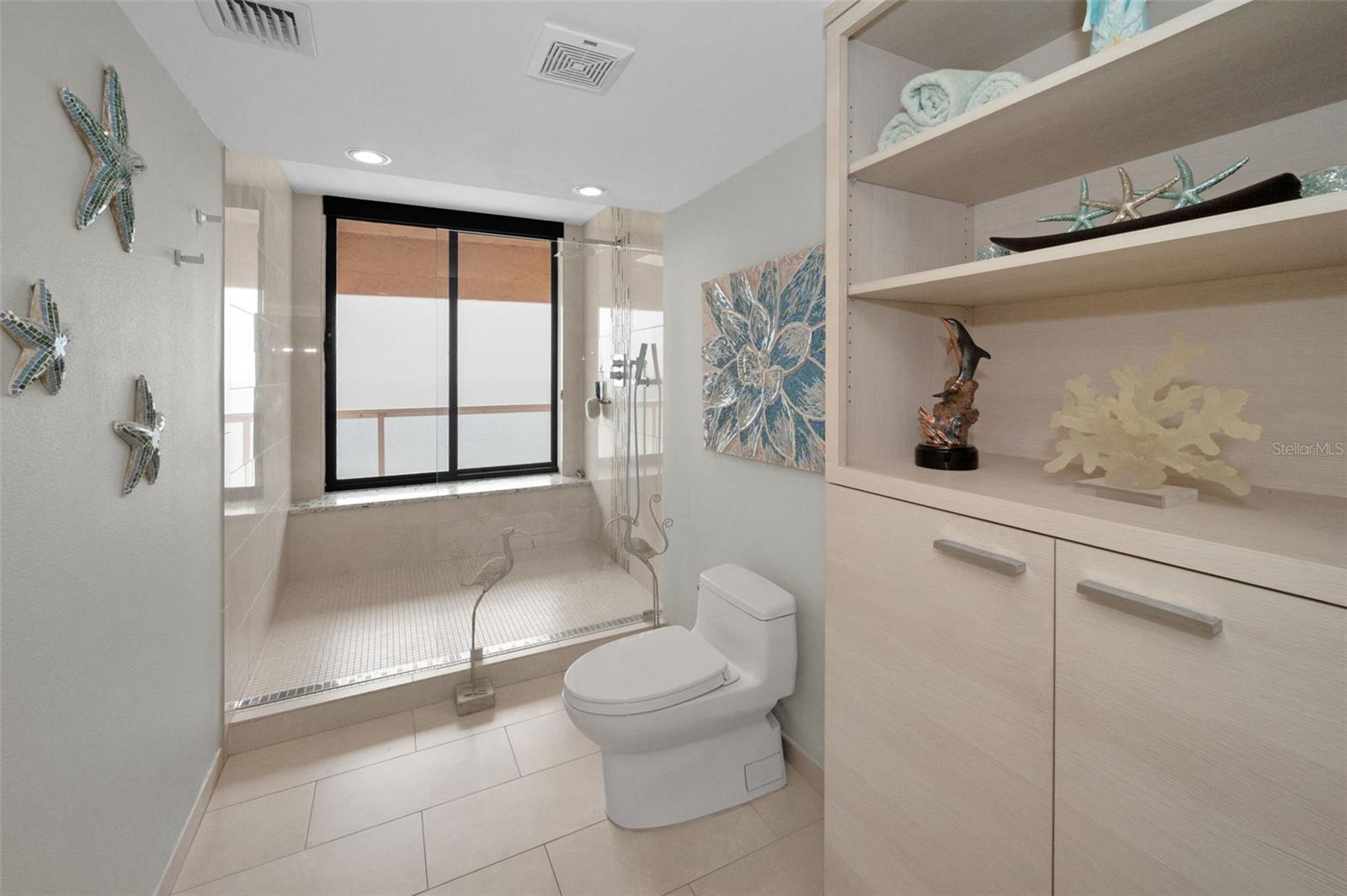 Master Bath Retreat with Spacious Walk In Shower, Imported Italian Marble Throughout.