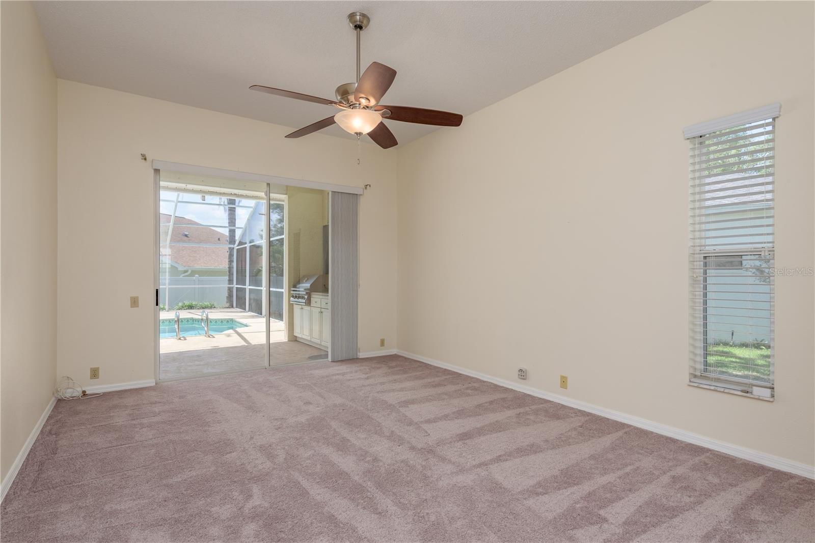 Primary Bedroom with views of Pool