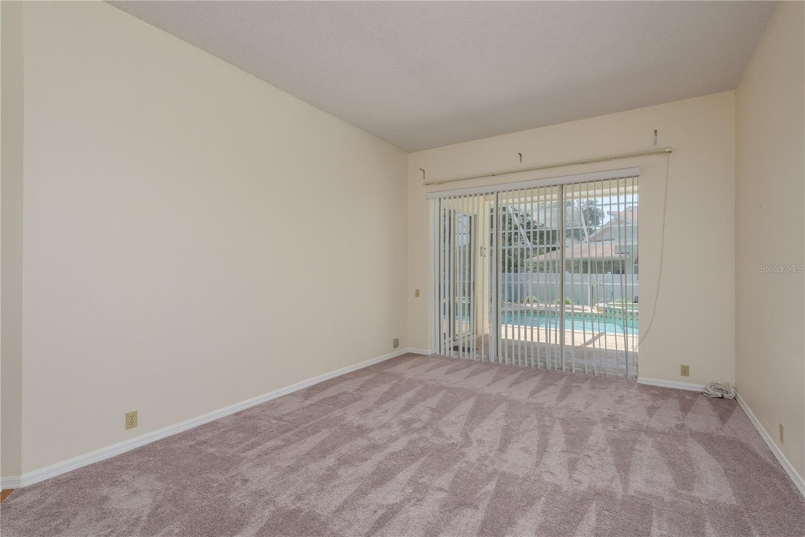 Living Room with view of Pool