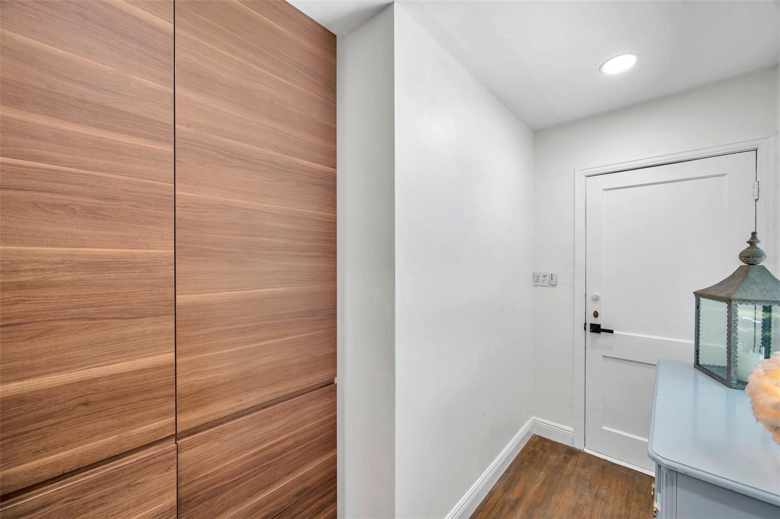 Kitchen pantry and additional storage in sleek cabinets