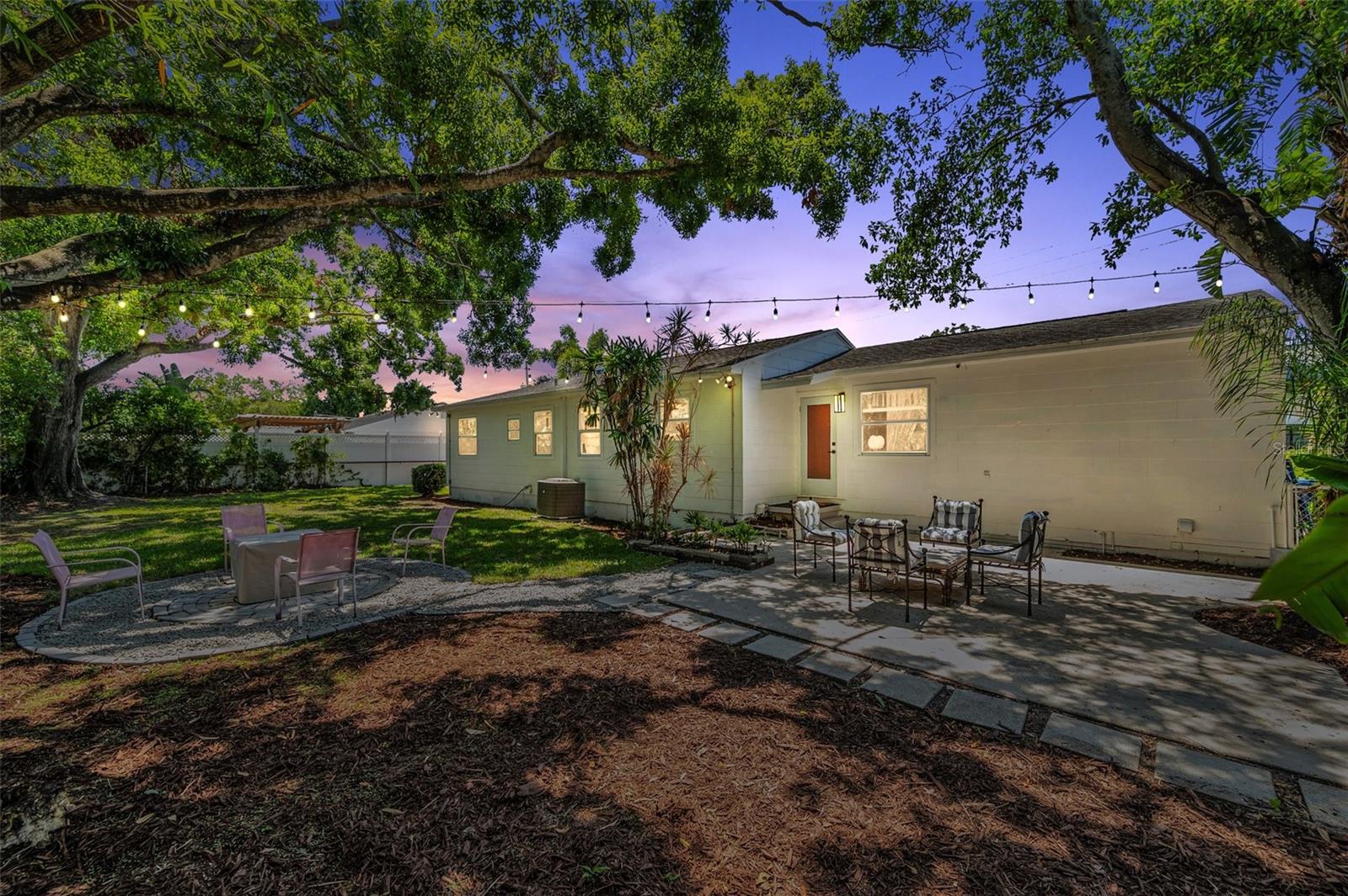 Extra space for entertaining under these majestic trees