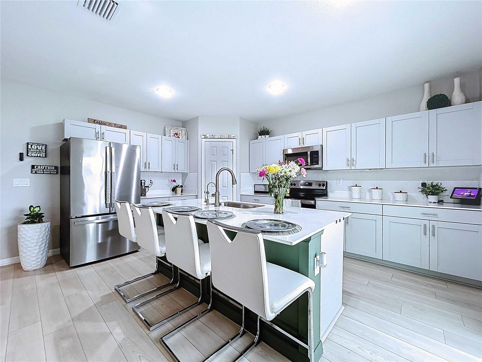 Spacious Kitchen with multiple cabinets