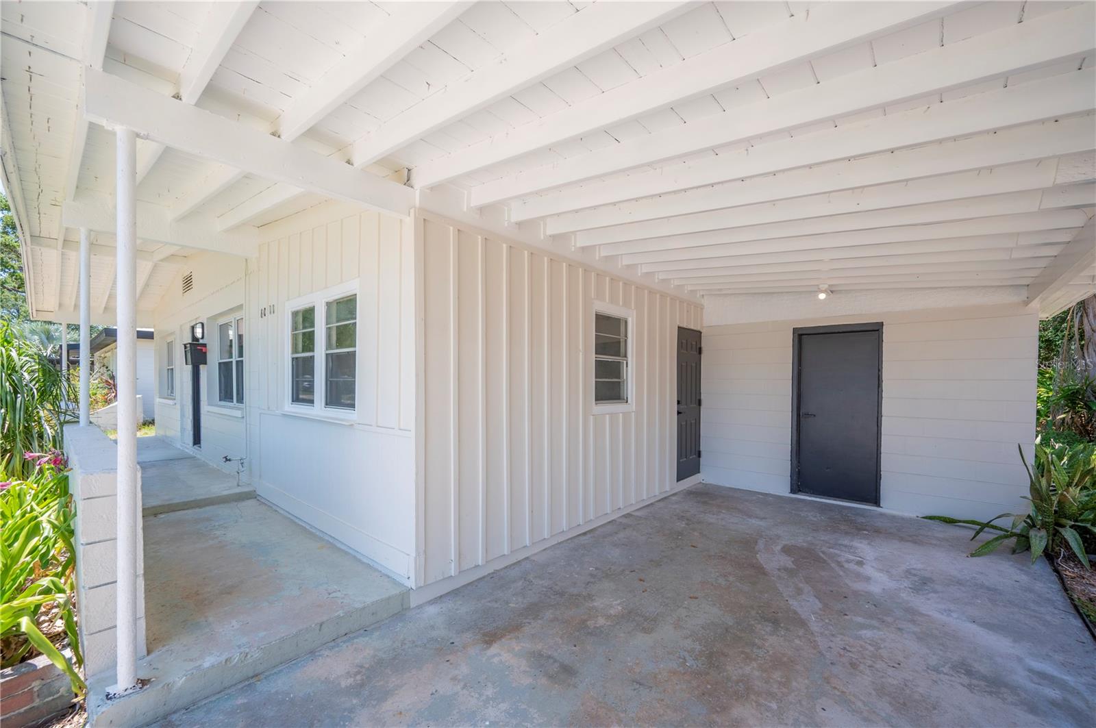 LARGE CARPORT WITH ACCESS TO LAUNDRY ROOM
