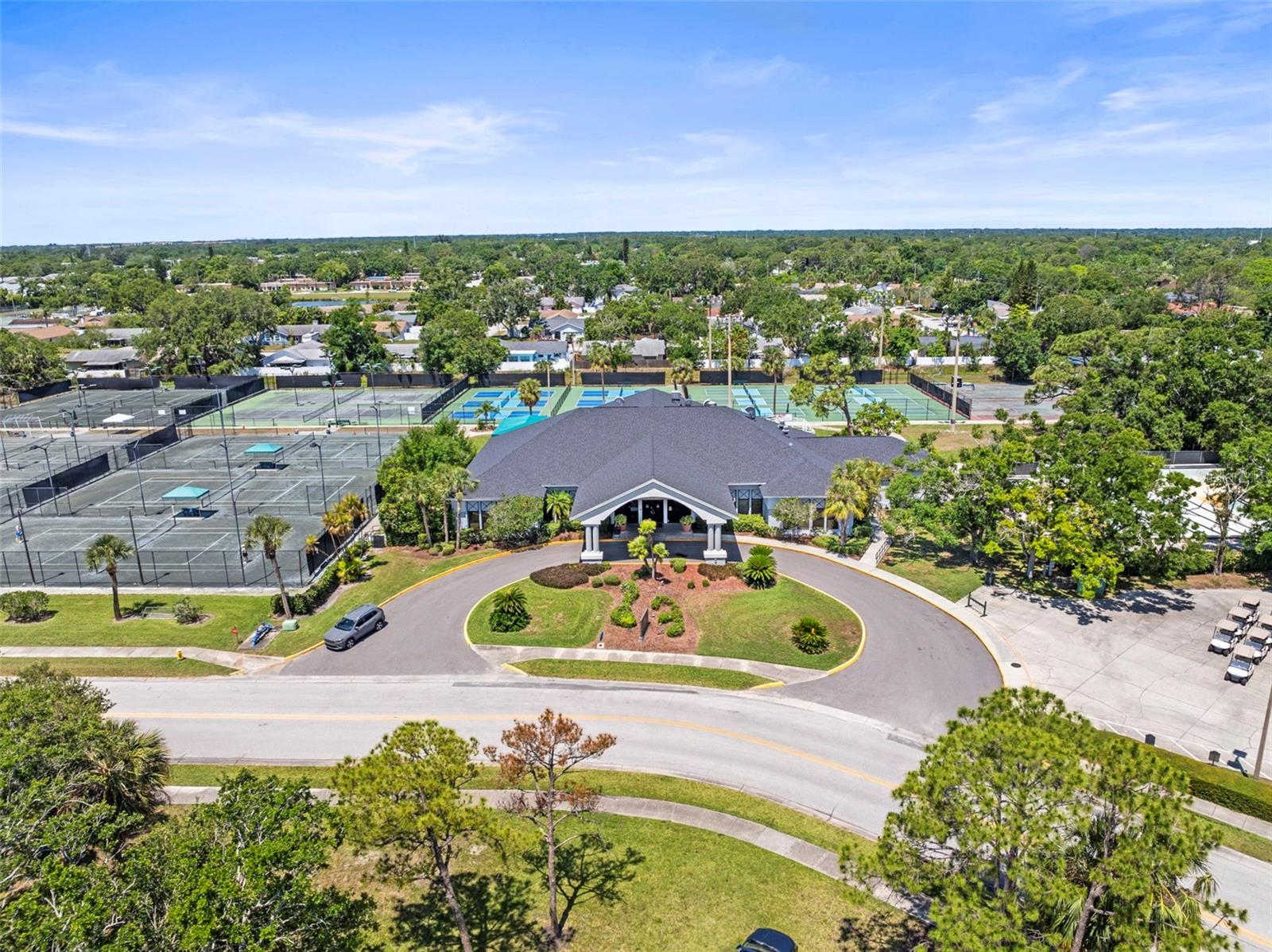 PINELLAS COUNTY LARGEST PICKLEBALL CENTER WITH 12 LIGHTED PROFESSIONAL COURTS AND 14 HAR-TRU CLAY COURTS