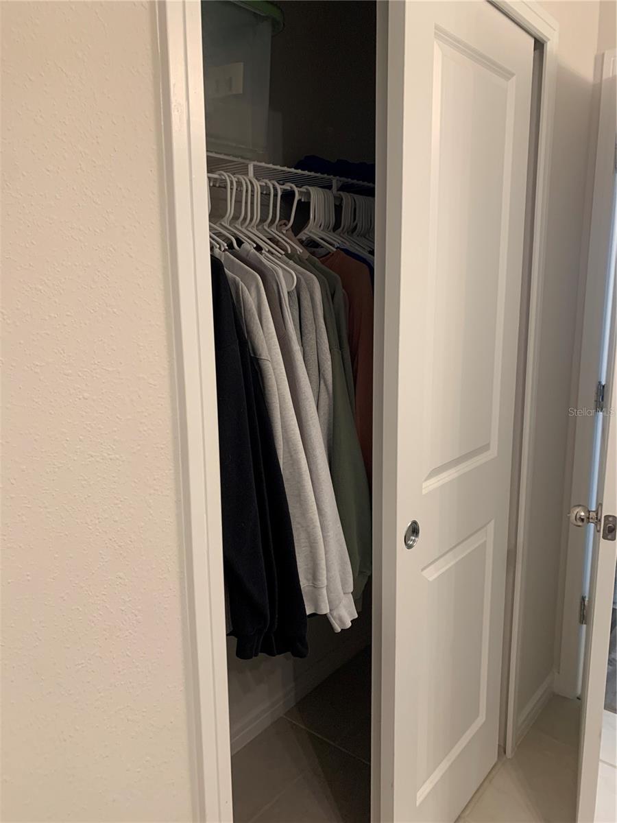 Closet in primary bathroom