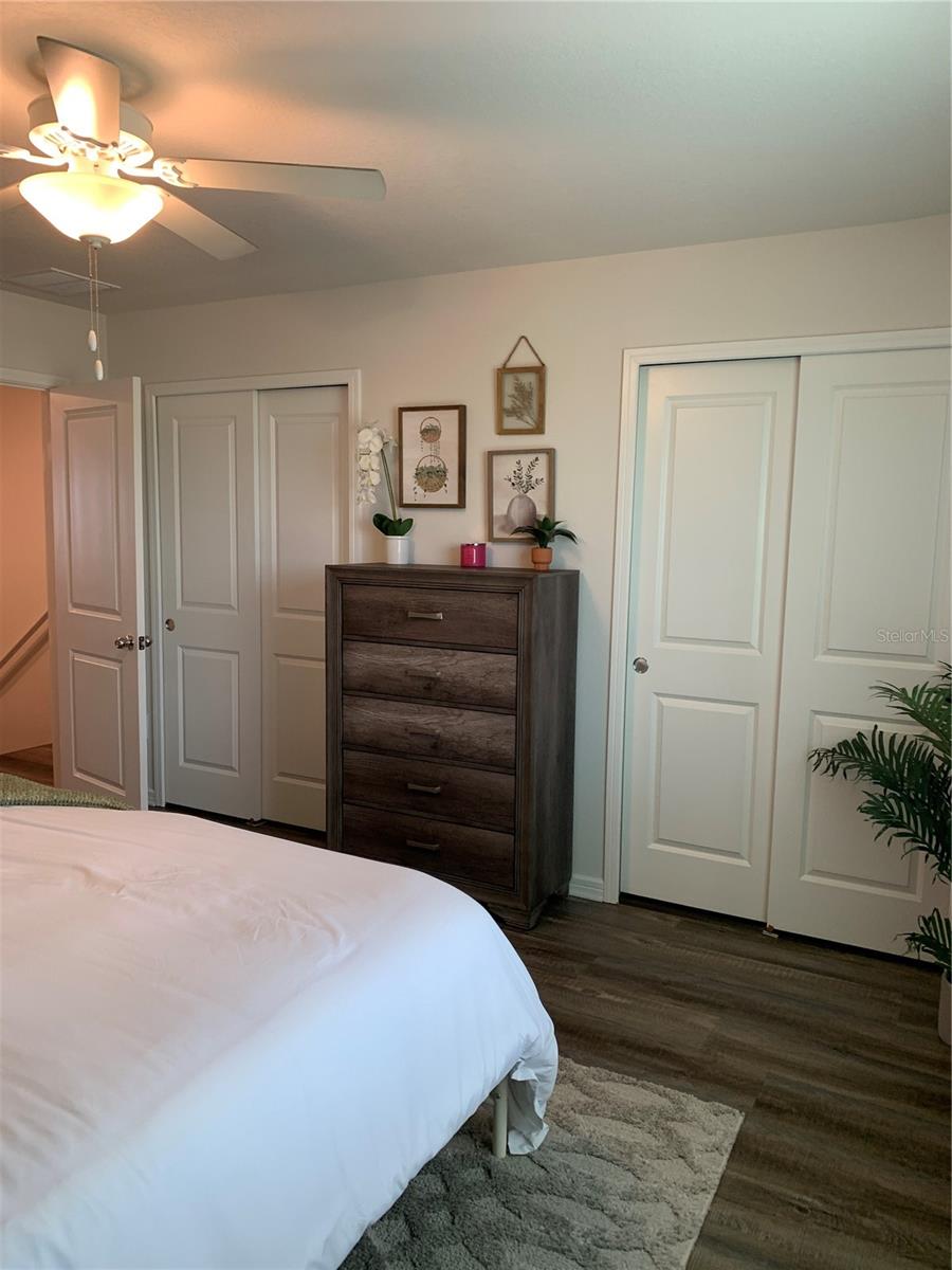 Two closets in primary bedroom