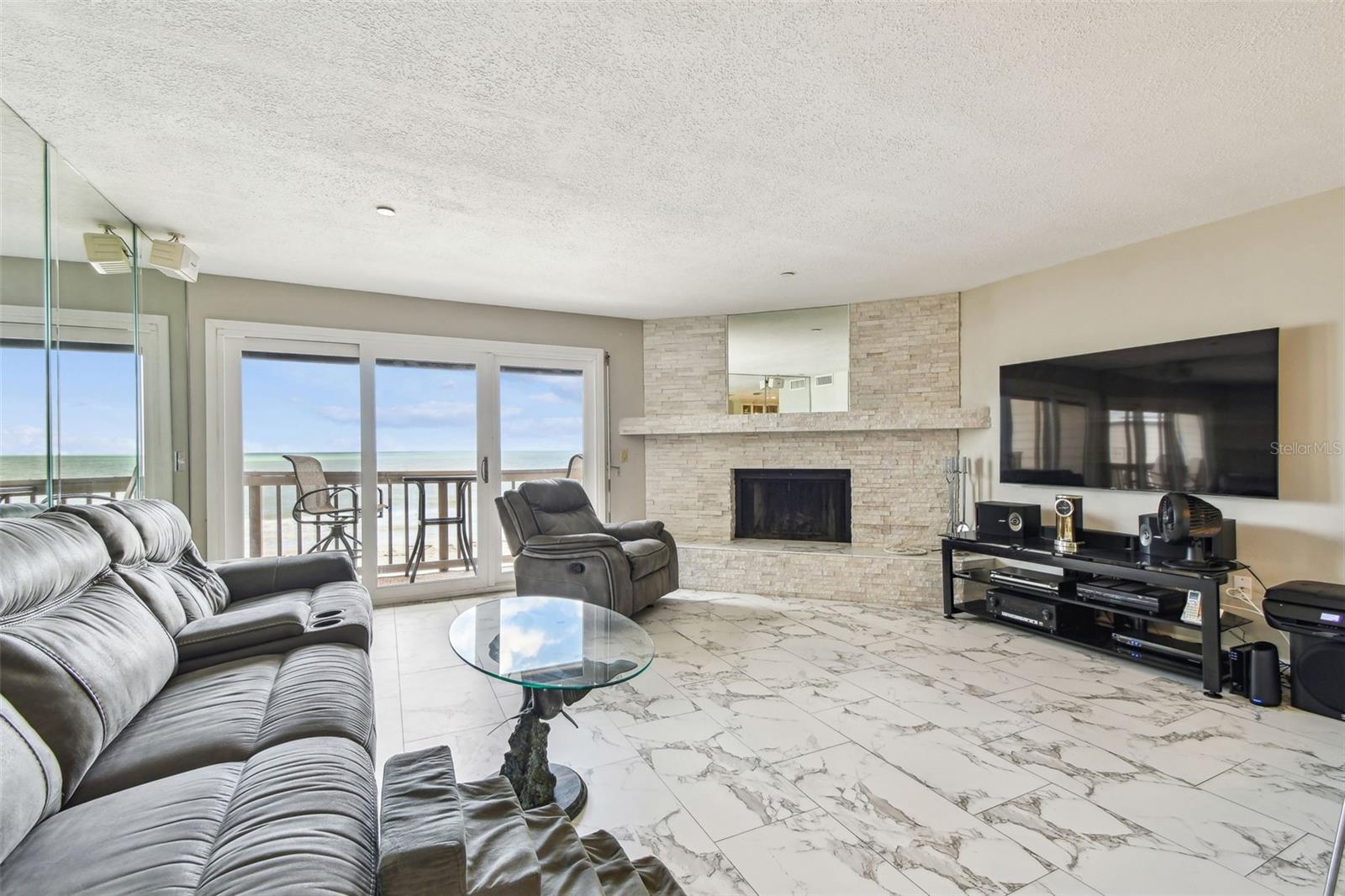 Great Room with sliding glass doors to gulf front balcony