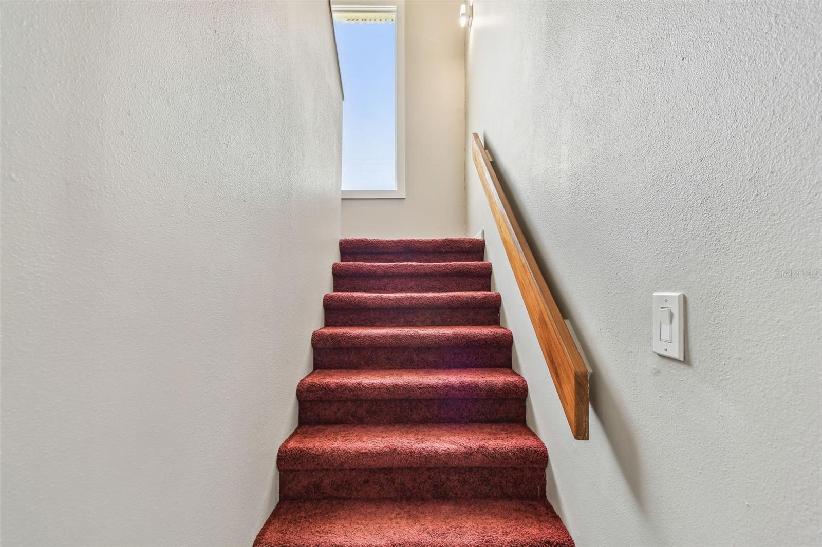 Stairs to 2nd floor of the condominium