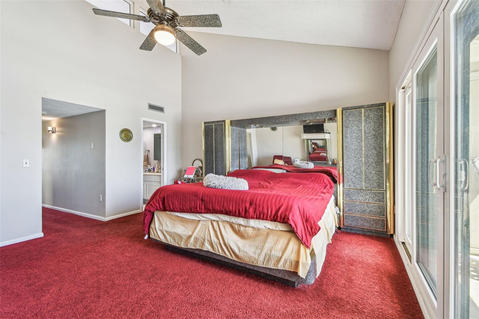 Primary Bedroom with vaulted ceilings