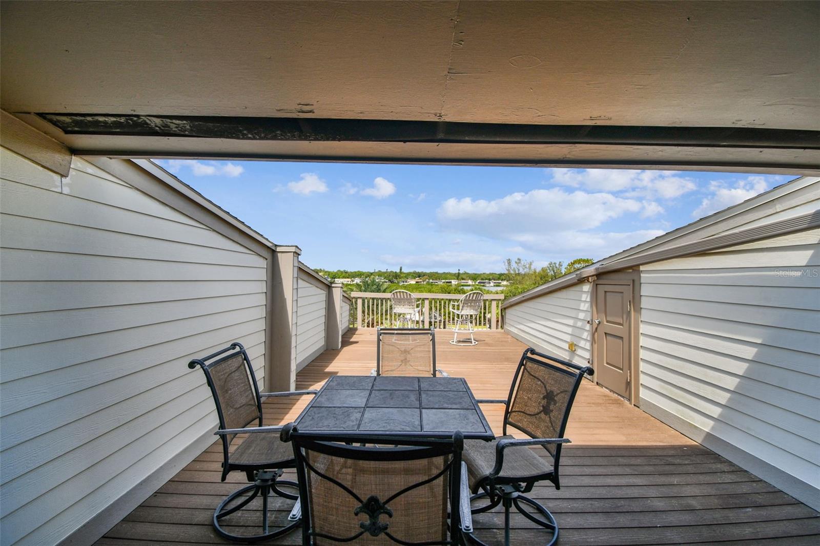 Oversized partially covered balcony