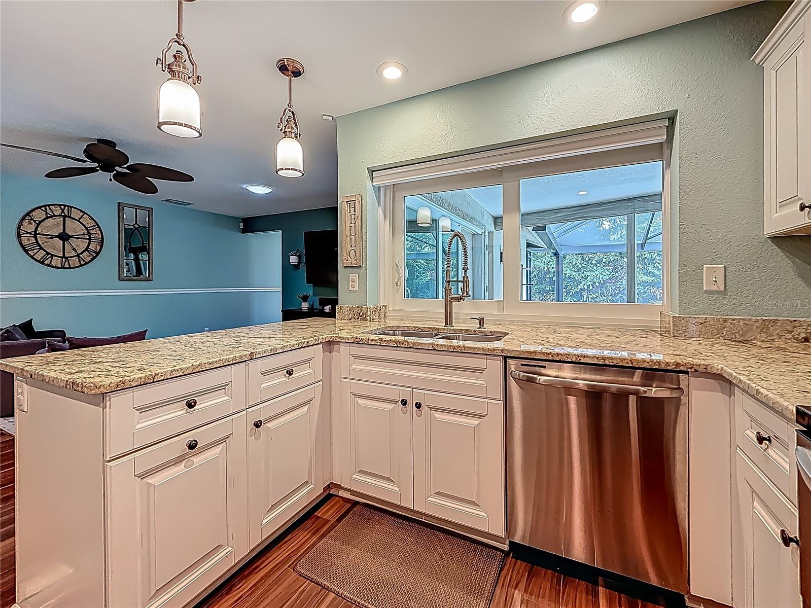 Kitchen - Passthrough to Outdoor Living & Pool - Family Room