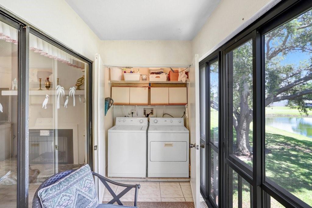 in unit washer and dryer on the enclosed lanai