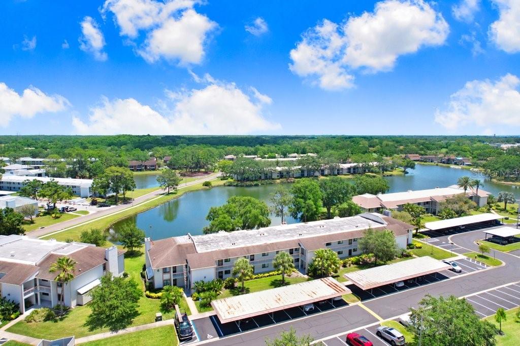 drone photo of the condo building with lake view