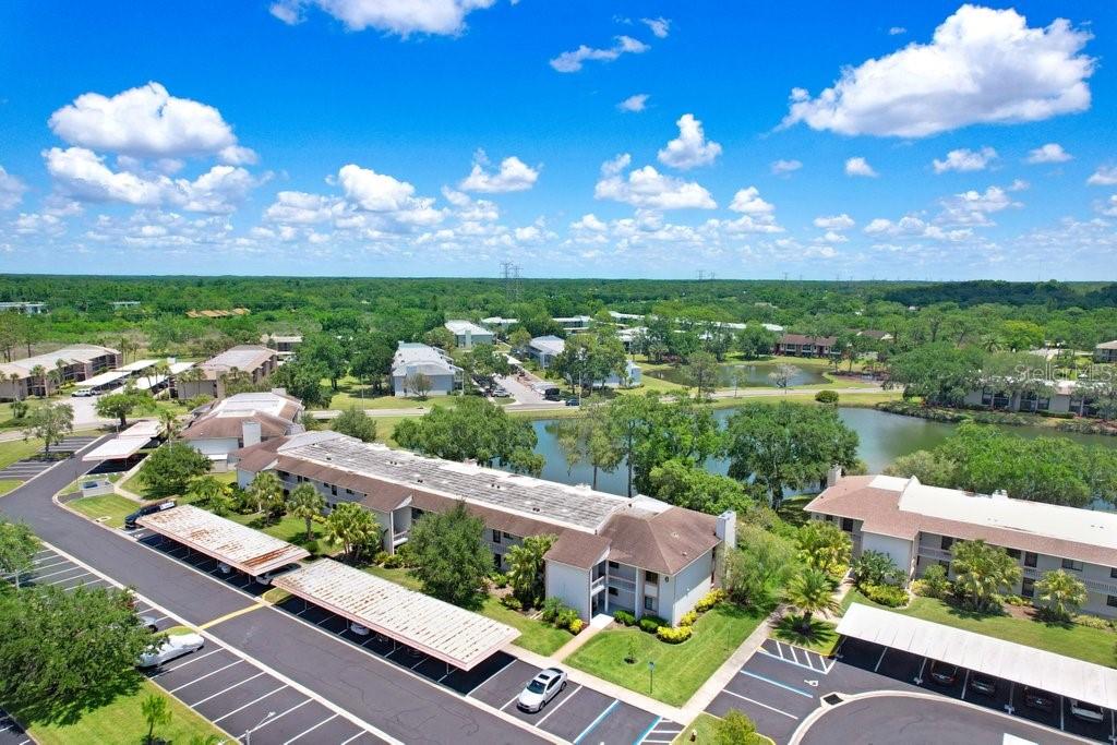 drone photo of the condo building with lake view