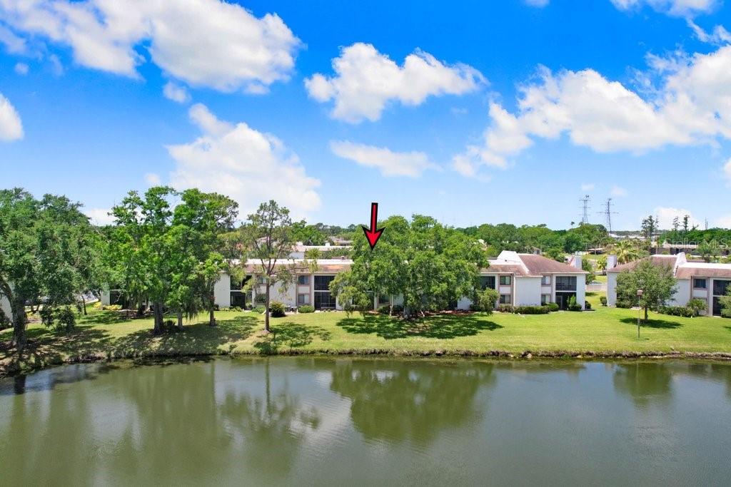drone photo of the condo building with lake view