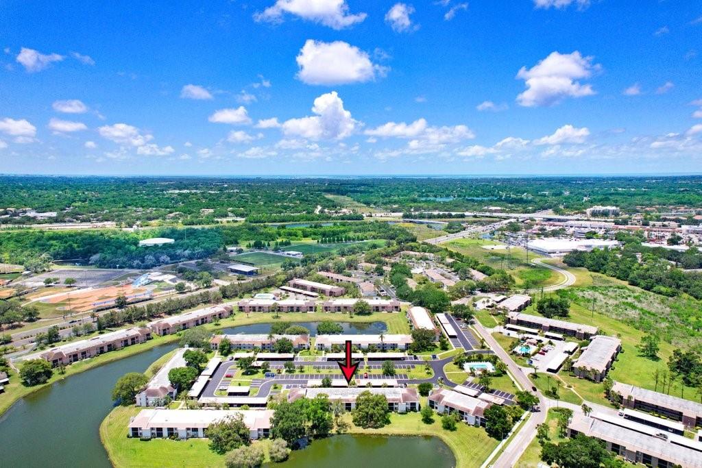 drone photo of the condo building with lake view