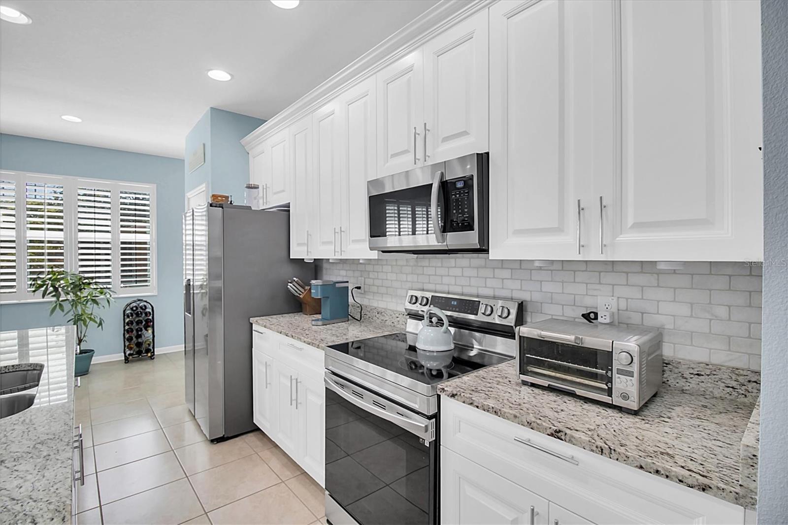 Granite counters with subway backsplash