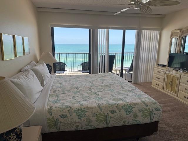 MASTER BEDROOM  WITH SLIDERS TO BALCONY