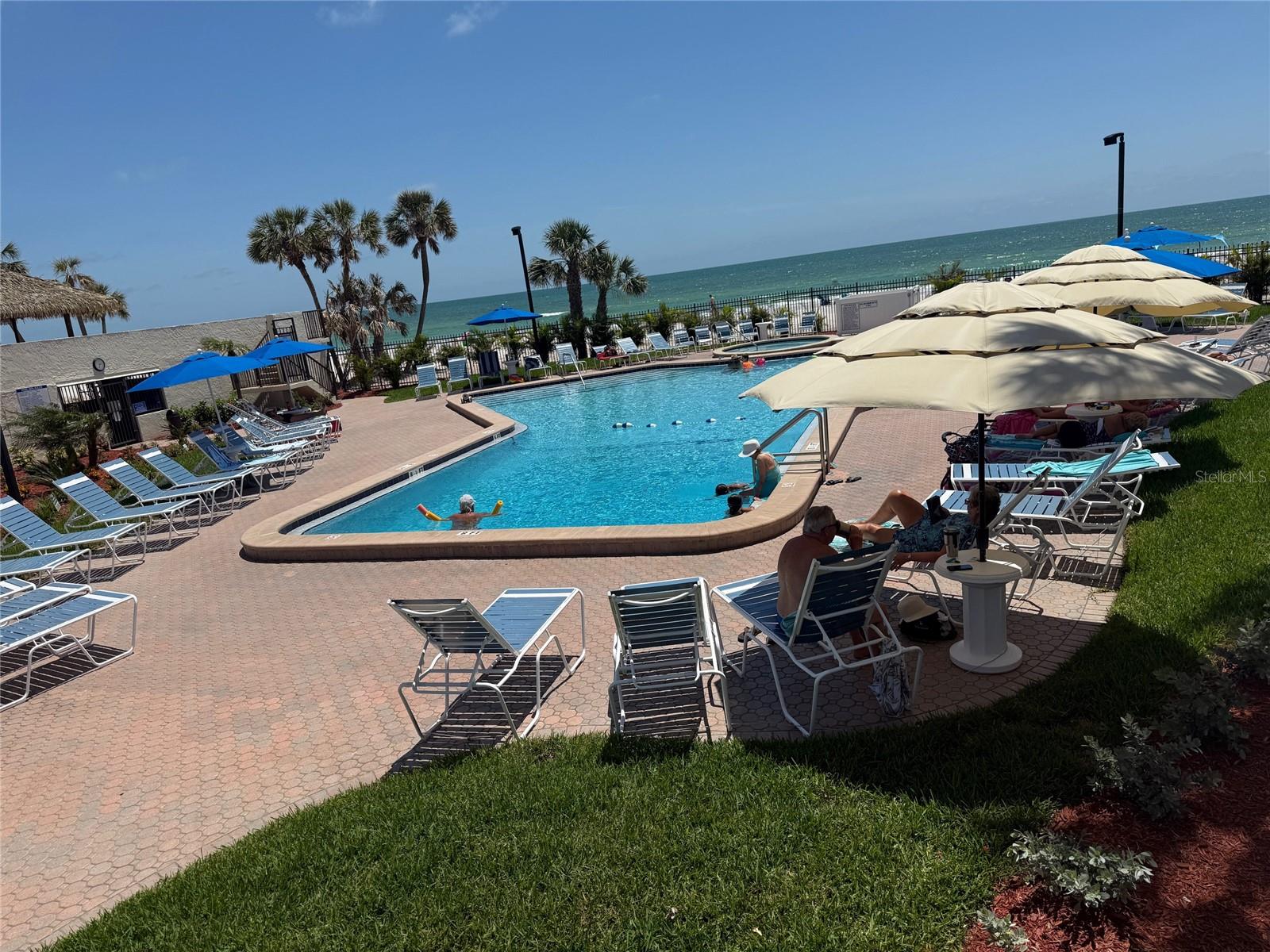 LARGE POOL OVERLOOKING BEACH