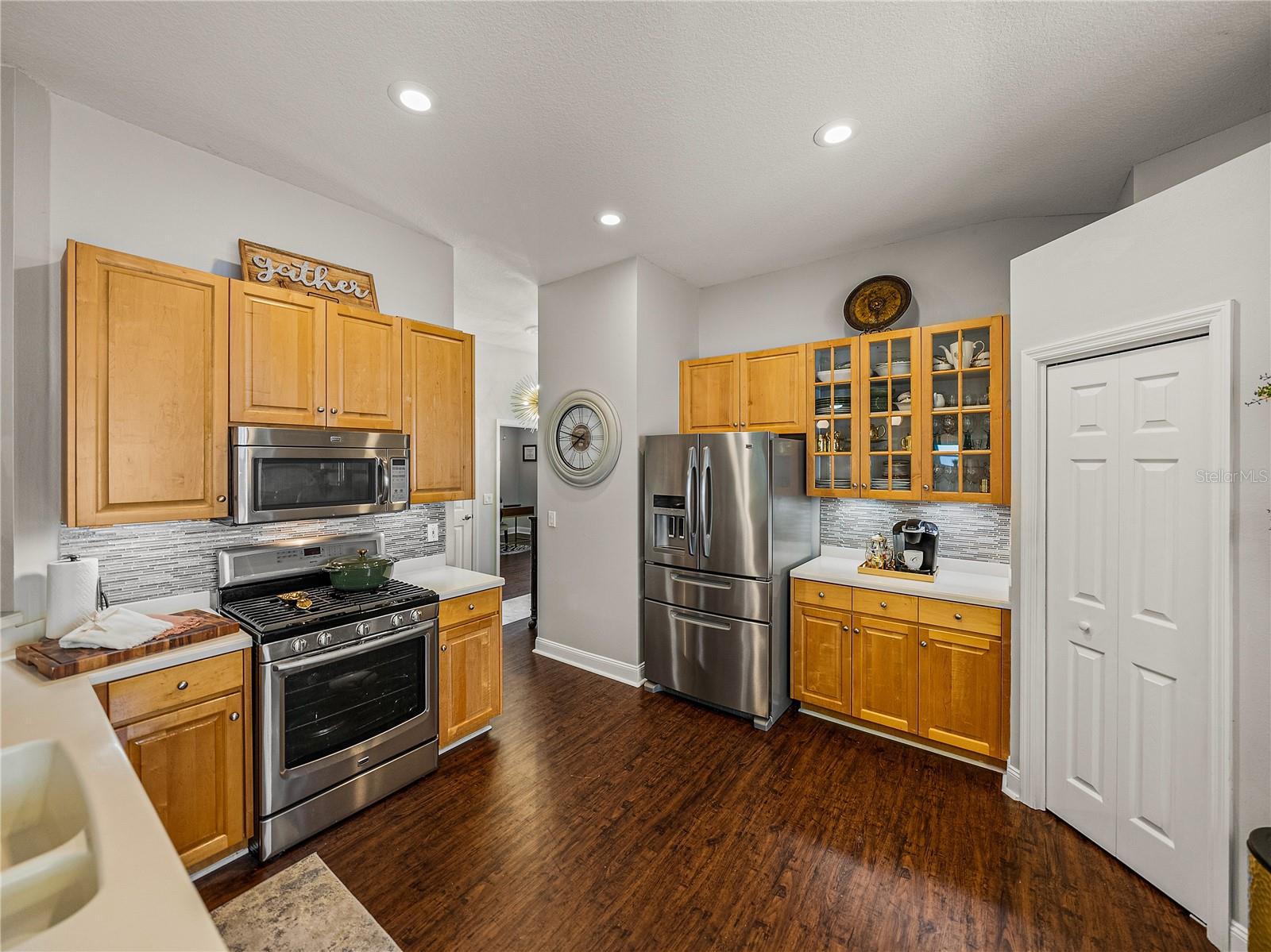 Kitchen with Gas Stainless Steel Appliances and Undercabinet Lighting