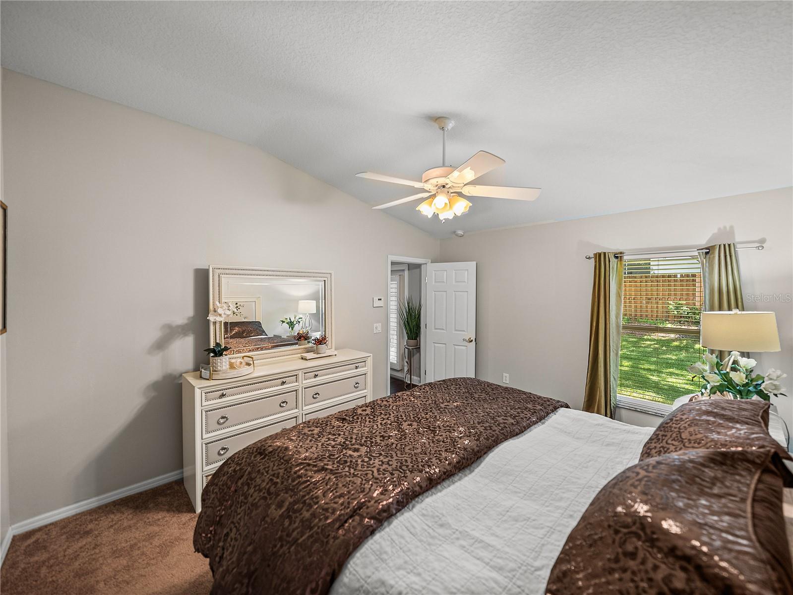 Primary Suite Alternate View with Ceiling Fan