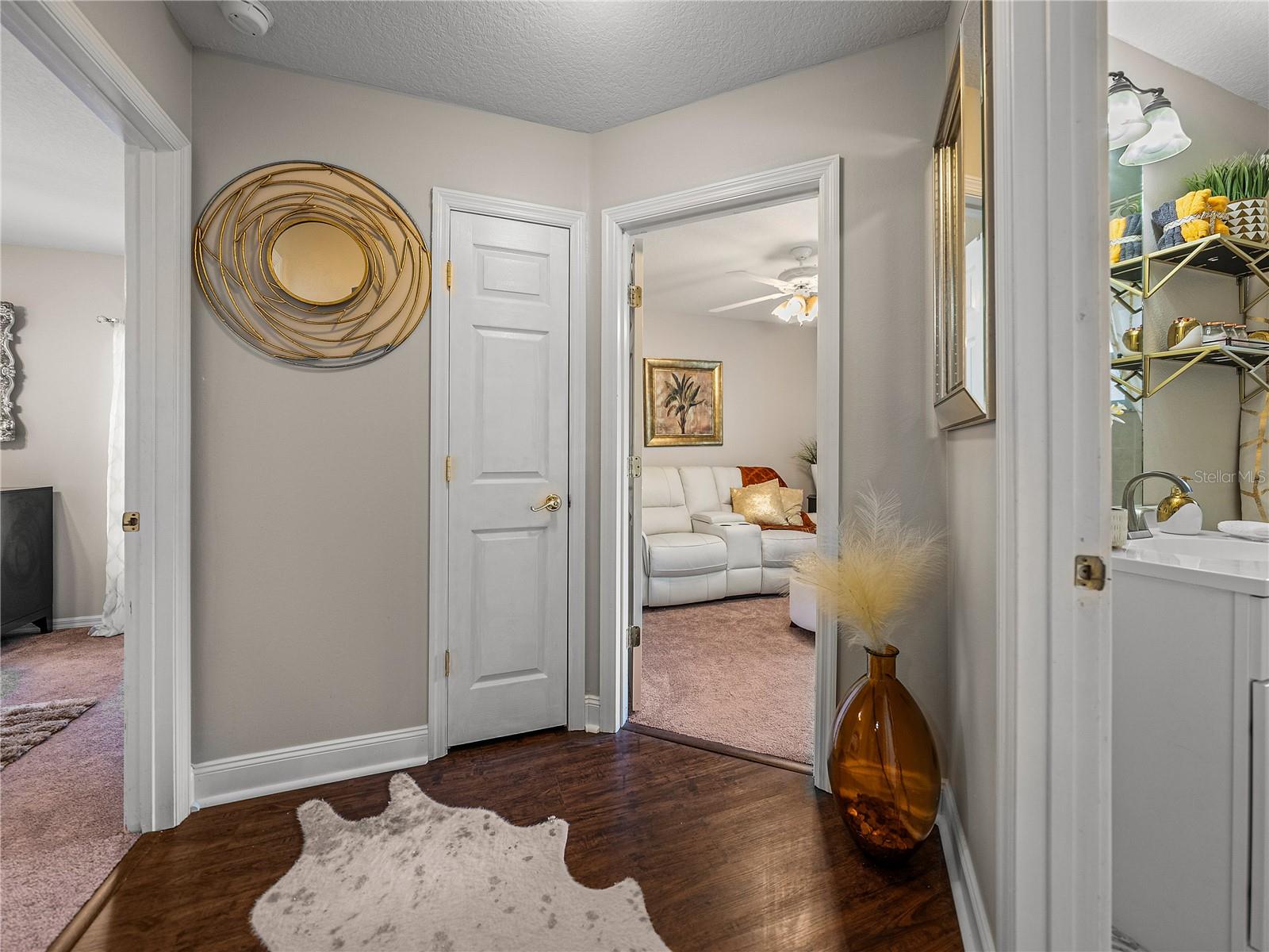 Hall to 2nd and 3rd Bedrooms with LVP Flooring