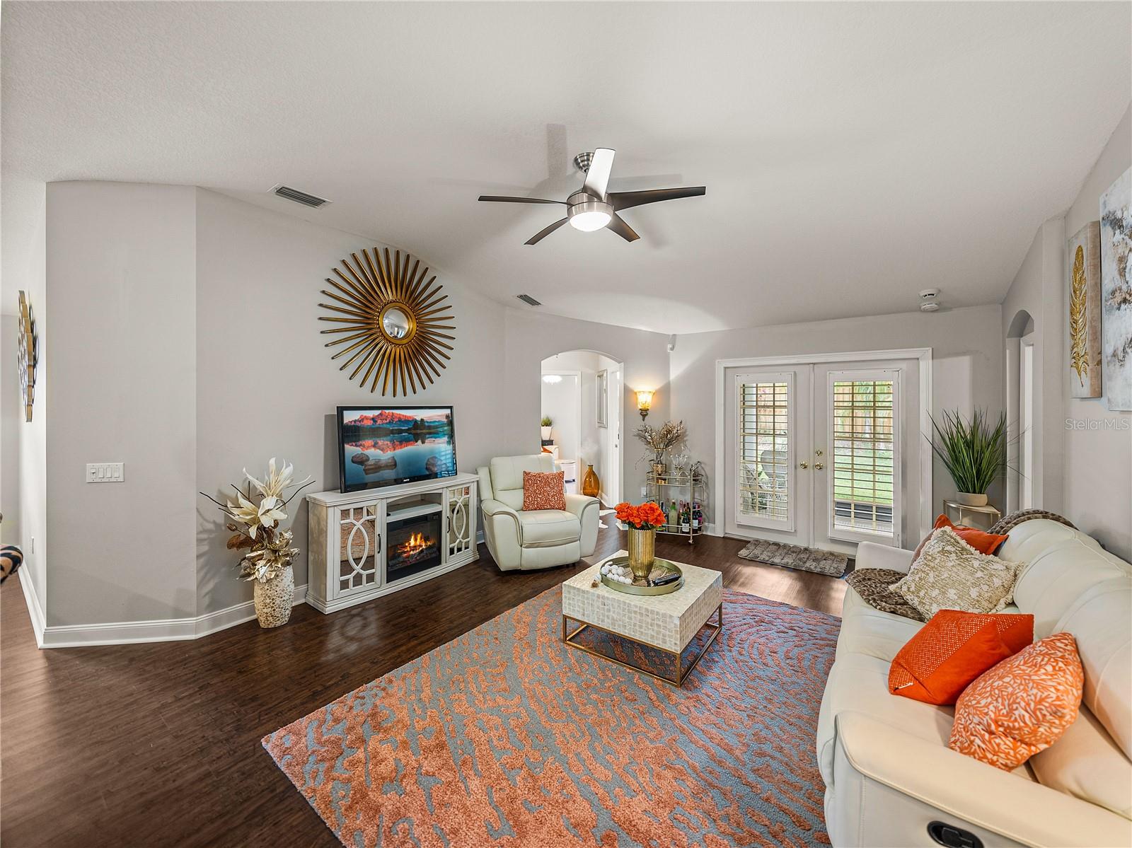 Family Room with LVP Flooring and Plantation Shutters