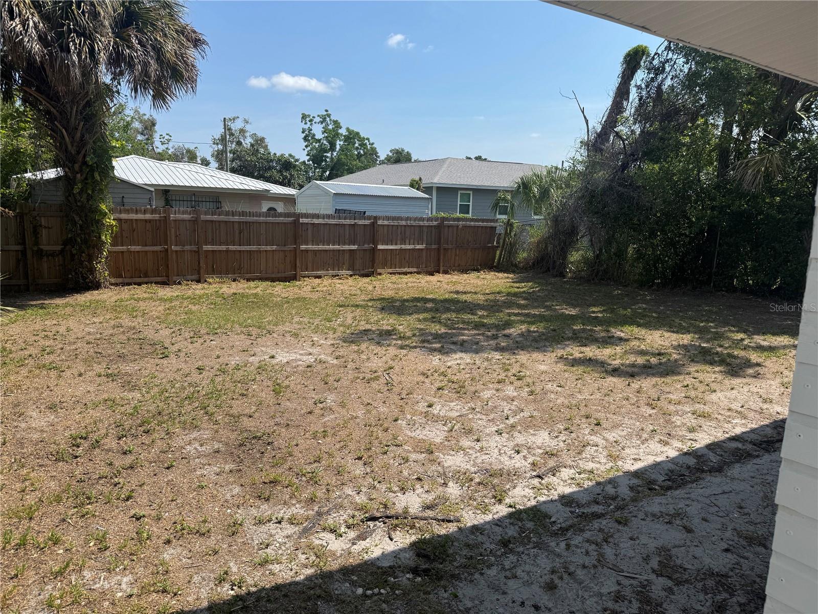 Large fenced in backyard