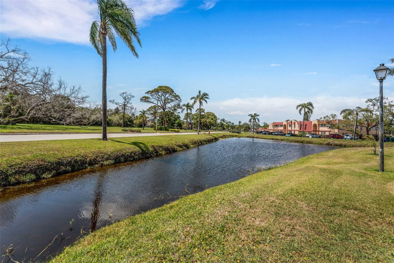 Pond in Front of Unit Near 2 Assigned Parking spaces